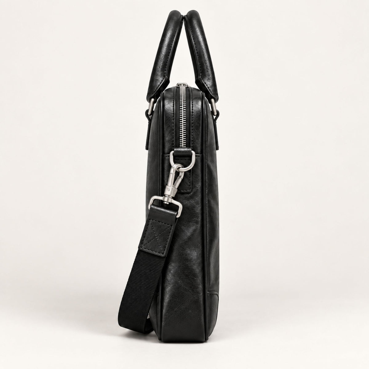 Side view of AMLAL black leather laptop briefcase with detachable shoulder strap