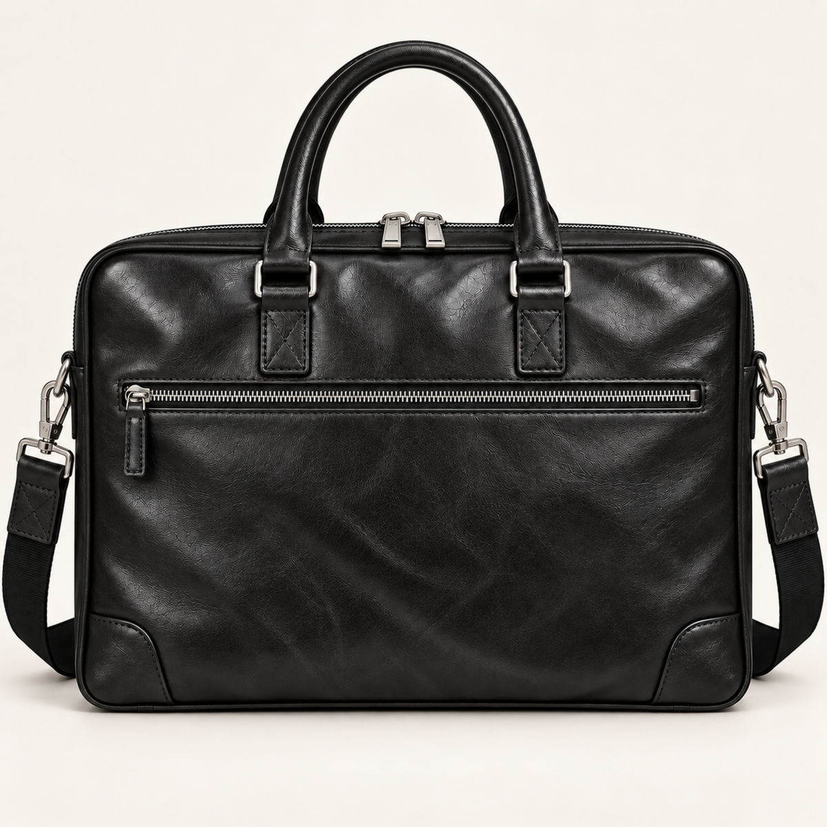 Back view of AMLAL black leather men’s briefcase with exterior zip pocket and shoulder strap